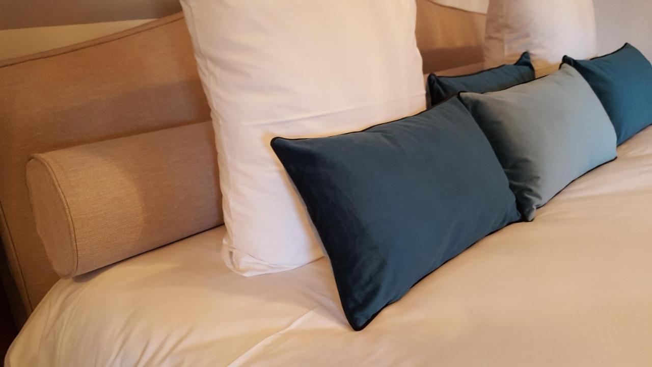 Détail de la literie et des coussins